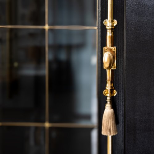 Cremone bolt on the 1880 door