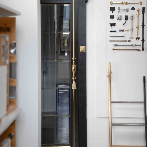 Cremone bolt on the 1880 door