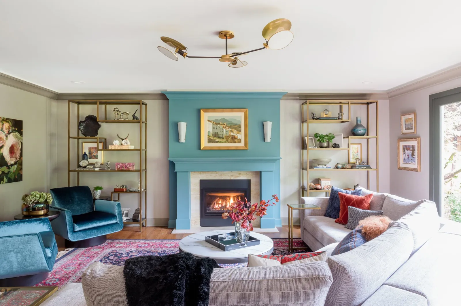 Southlands Renovation — teal fireplace and living room